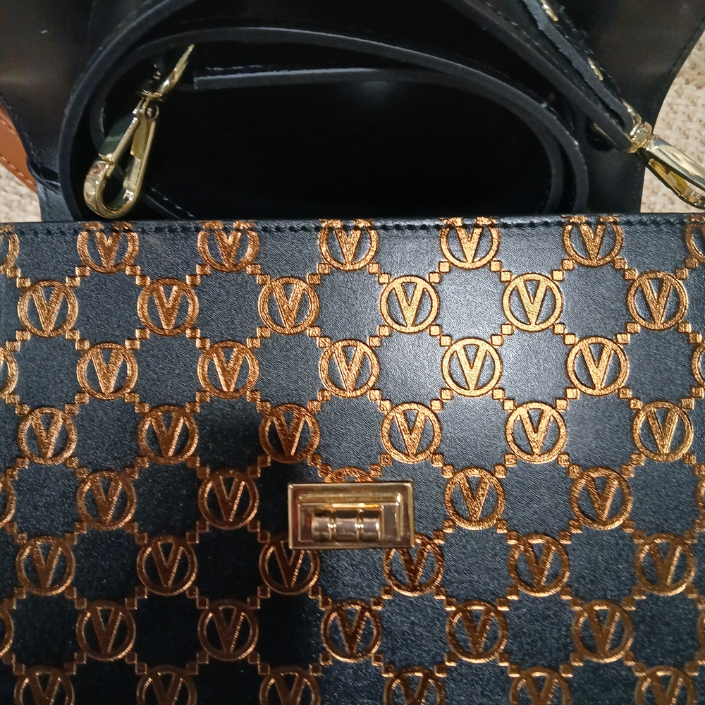 Elegant Black and Gold Designer Handbag